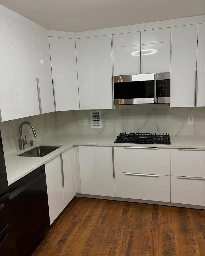 Restored kitchen with white cabinets after water damage in Columbia